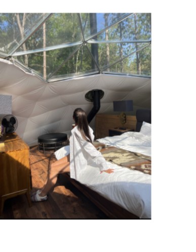 Dr. Emilie Vos in a geodesic dome suite at Glen Oro Farm